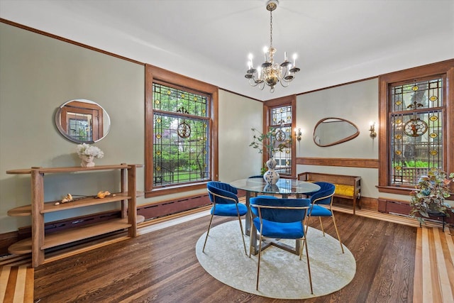 2837 N Marietta Ave, Milwaukee, WI 53211 - dining area with a chandelier, wood finished floors, and crown molding