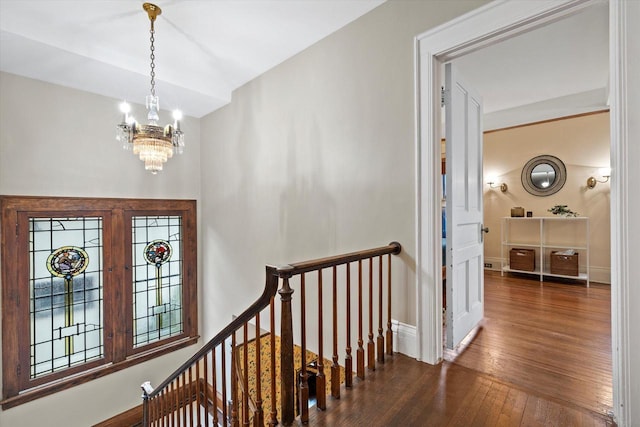 2837 N Marietta Ave, Milwaukee, WI 53211 - entrance foyer with wood-type flooring, a chandelier, and baseboards