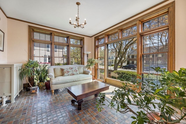304 16th St, Racine, WI 53403 - sunroom featuring a chandelier