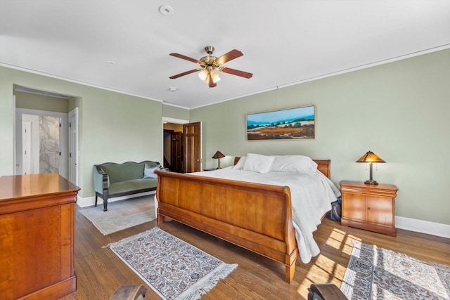 304 16th St, Racine, WI 53403 - bedroom with ornamental molding, baseboards, wood finished floors, and ceiling fan
