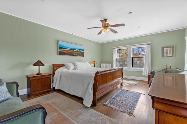 304 16th St, Racine, WI 53403 - bedroom featuring wood finished floors, ornamental molding, baseboards, and ceiling fan