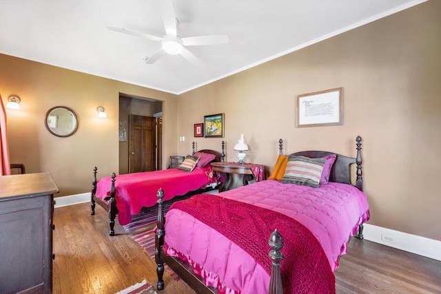304 16th St, Racine, WI 53403 - bedroom with wood finished floors, baseboards, ornamental molding, and ceiling fan