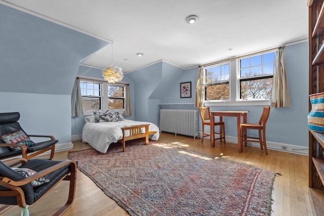304 16th St, Racine, WI 53403 - bedroom featuring radiator heating unit, hardwood / wood-style floors, ornamental molding, and baseboards