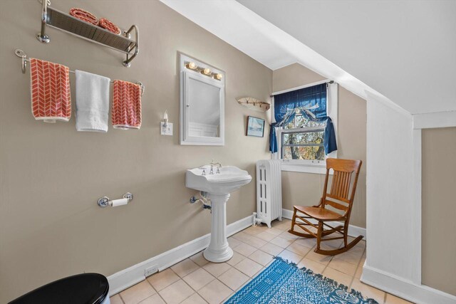 304 16th St, Racine, WI 53403 - bathroom with radiator heating unit, tile patterned flooring, and baseboards