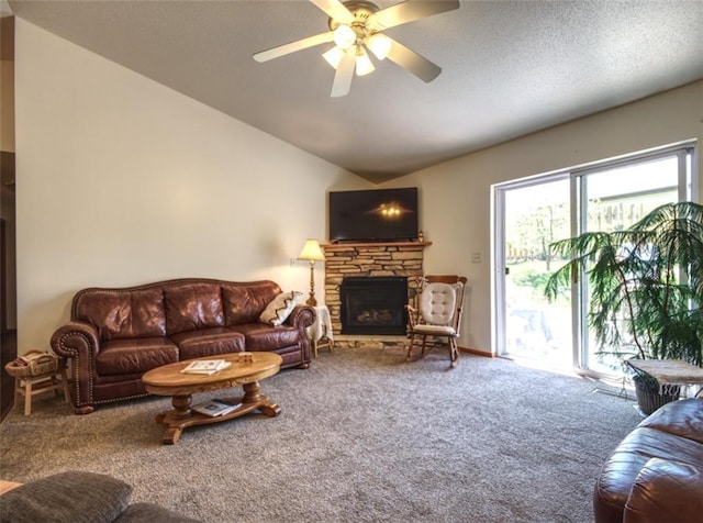 429 Riggs St, Bloomer, WI 54724 - carpeted living room featuring vaulted ceiling, a ceiling fan, and a fireplace
