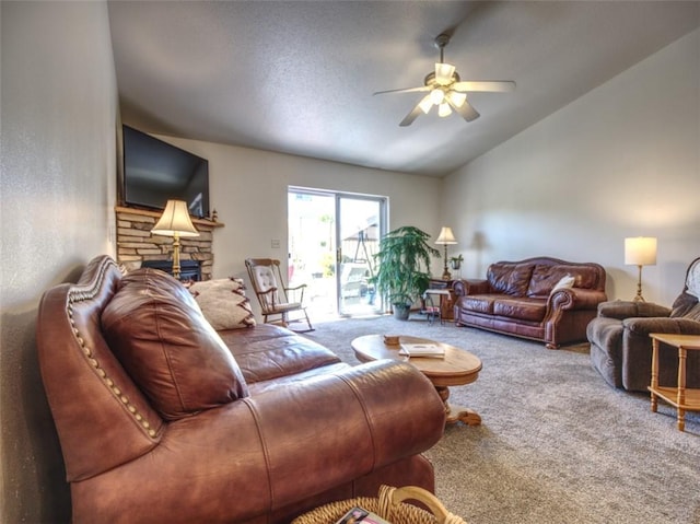 429 Riggs St, Bloomer, WI 54724 - living room featuring carpet flooring, lofted ceiling, ceiling fan, and a fireplace