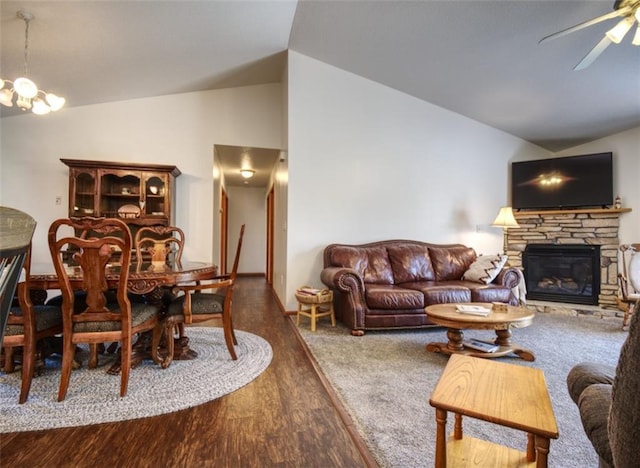 429 Riggs St, Bloomer, WI 54724 - living room with lofted ceiling, a fireplace, ceiling fan, and wood finished floors