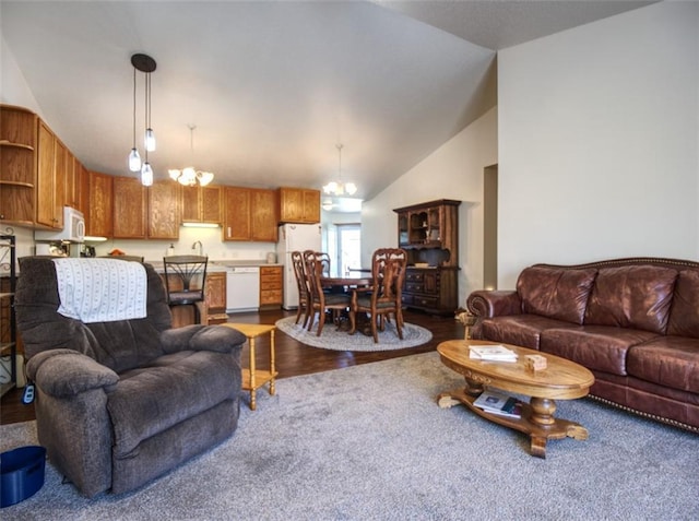 429 Riggs St, Bloomer, WI 54724 - carpeted living area with vaulted ceiling, a chandelier, and a sink