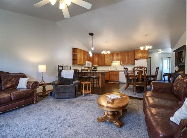 429 Riggs St, Bloomer, WI 54724 - living area with a chandelier, vaulted ceiling, ceiling fan, and dark carpet