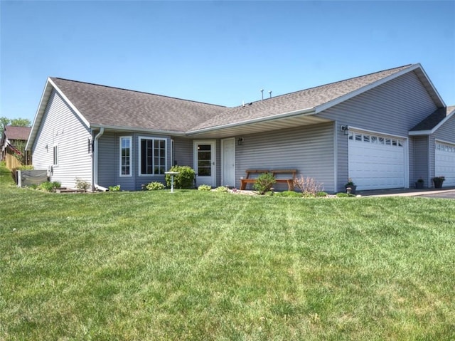 429 Riggs St, Bloomer, WI 54724 - ranch-style house featuring an attached garage, a front lawn, and roof with shingles