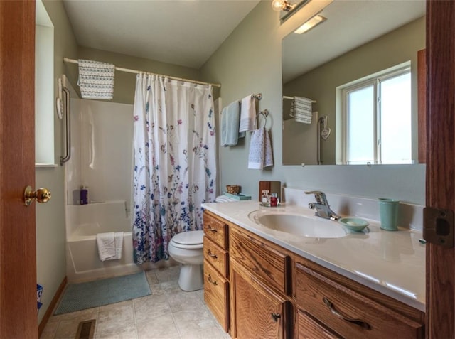 429 Riggs St, Bloomer, WI 54724 - bathroom featuring toilet, vanity, shower / tub combo, and tile patterned floors