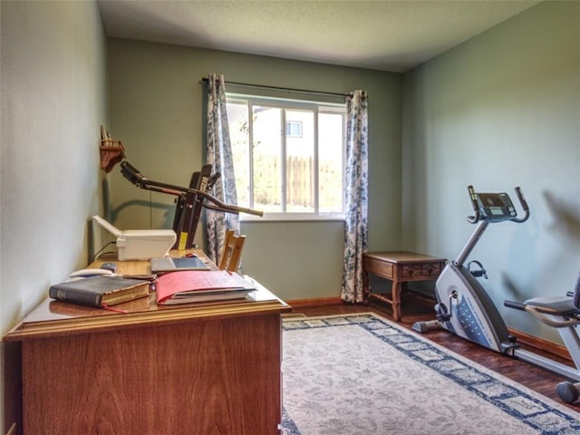 429 Riggs St, Bloomer, WI 54724 - home office featuring baseboards and wood finished floors