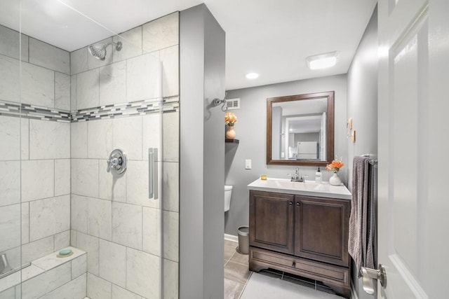 528 High St, Walworth, WI 53184 - full bath featuring toilet, a stall shower, vanity, and tile patterned floors