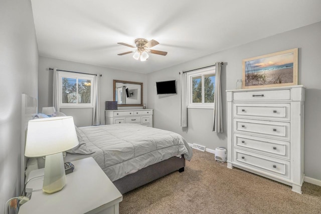 528 High St, Walworth, WI 53184 - carpeted bedroom featuring baseboards and a ceiling fan
