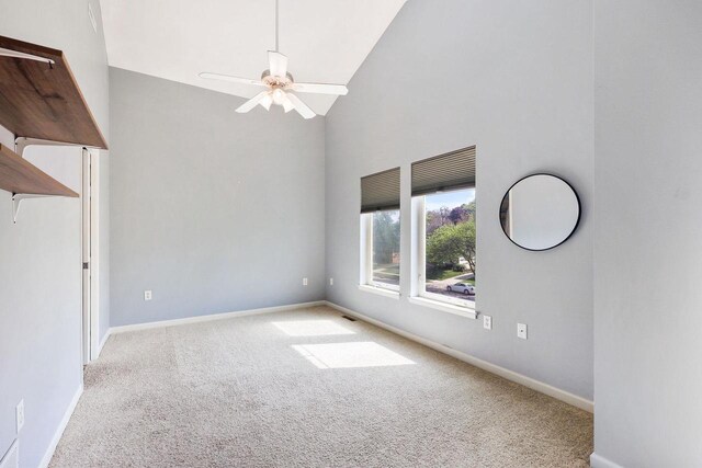 612 N Midvale Blvd, Madison, WI 53705 - unfurnished room featuring carpet, high vaulted ceiling, a ceiling fan, and baseboards