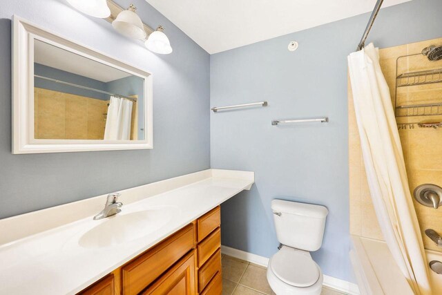 612 N Midvale Blvd, Madison, WI 53705 - bathroom featuring vanity, tile patterned flooring, shower / tub combo, toilet, and baseboards