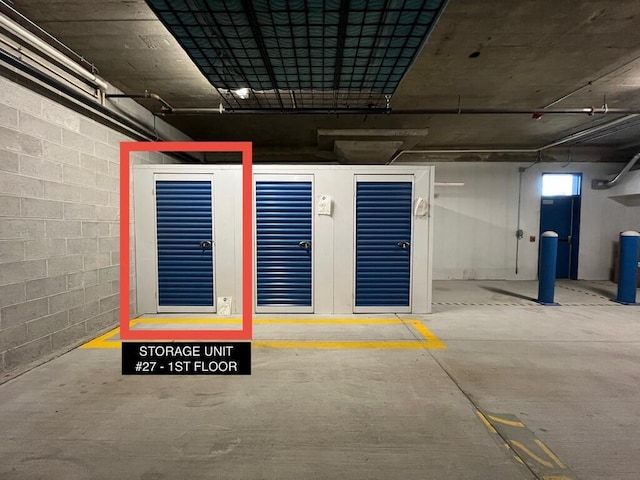 106 W Seeboth St Unit 503, Milwaukee, WI 53204 - parking deck featuring concrete block wall