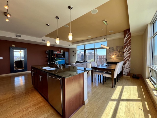 106 W Seeboth St Unit 503, Milwaukee, WI 53204 - kitchen featuring a sink, dishwasher, light wood-style floors, and decorative light fixtures