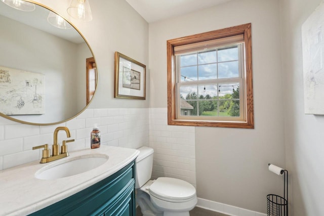W308S2787 Wild Berry Ct, Waukesha, WI 53188 - bathroom featuring toilet, vanity, and tile walls