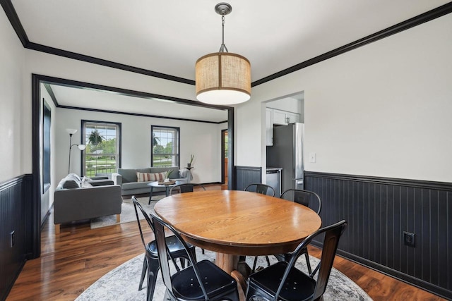 W308S2787 Wild Berry Ct, Waukesha, WI 53188 - dining room with a wainscoted wall, dark wood-type flooring, and ornamental molding