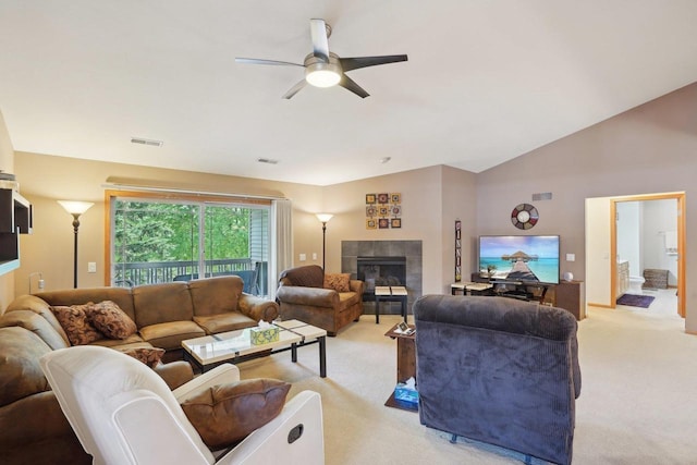 802 Herndon Dr Unit C, Madison, WI 53718 - living room featuring light colored carpet, a ceiling fan, and a tile fireplace