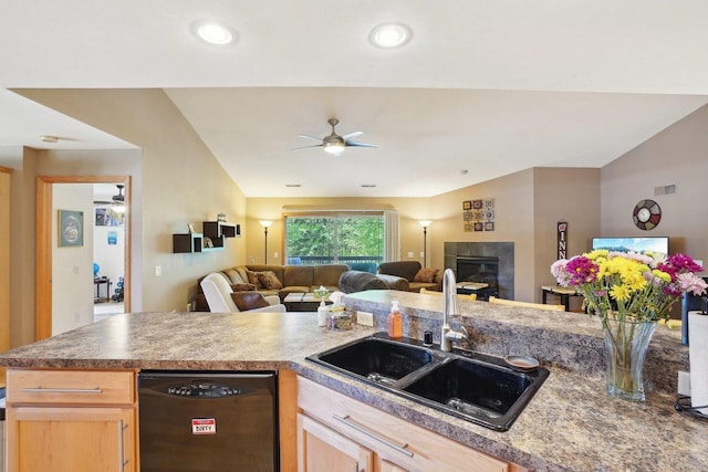 802 Herndon Dr Unit C, Madison, WI 53718 - kitchen featuring a ceiling fan, dishwasher, a sink, open floor plan, and a tile fireplace