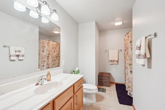 802 Herndon Dr Unit C, Madison, WI 53718 - full bathroom featuring tile patterned floors, toilet, vanity, baseboards, and a shower with curtain