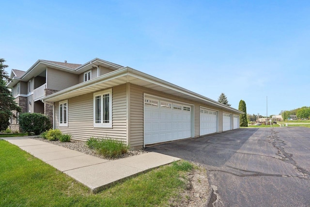 802 Herndon Dr Unit C, Madison, WI 53718 - view of home's exterior with driveway