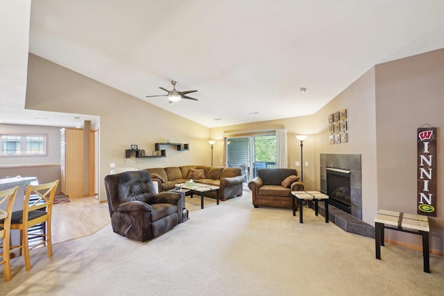 802 Herndon Dr Unit C, Madison, WI 53718 - living room featuring lofted ceiling, a fireplace, carpet, and a ceiling fan
