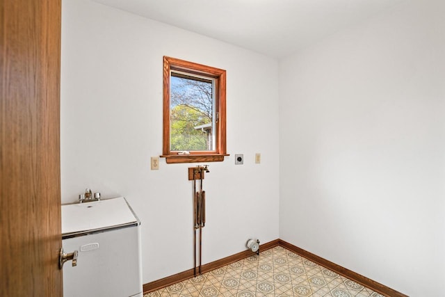 9 Sandalwood Ct, Wind Point, WI 53402 - washroom featuring electric dryer hookup, baseboards, and light flooring
