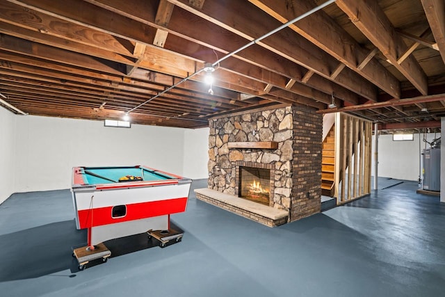 9 Sandalwood Ct, Wind Point, WI 53402 - finished below grade area with water heater, billiards table, and a fireplace