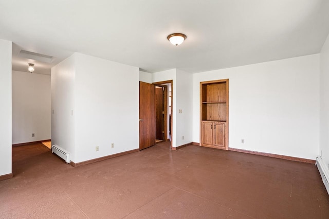 9 Sandalwood Ct, Wind Point, WI 53402 - unfurnished room featuring baseboards, a baseboard heating unit, a baseboard radiator, and finished concrete floors