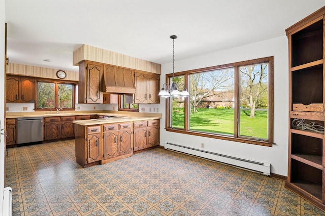 9 Sandalwood Ct, Wind Point, WI 53402 - kitchen with stainless steel dishwasher, a baseboard heating unit, a peninsula, light countertops, and a sink