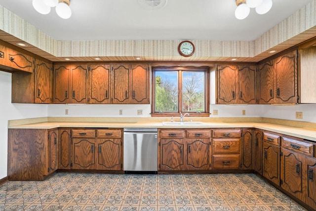 9 Sandalwood Ct, Wind Point, WI 53402 - kitchen with dishwasher, a sink, light countertops, and brown cabinets