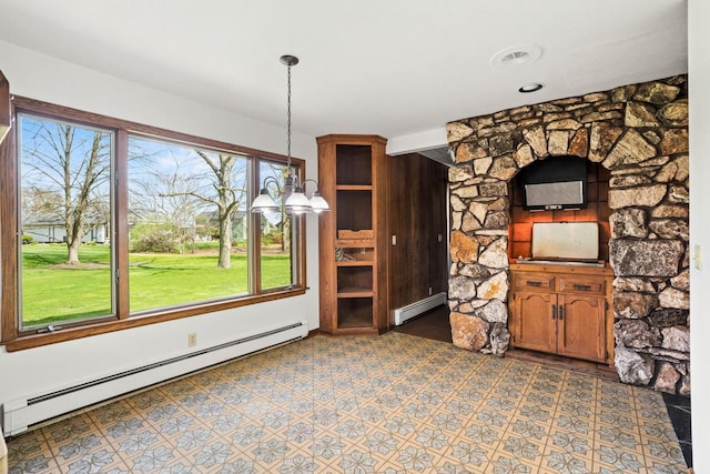 9 Sandalwood Ct, Wind Point, WI 53402 - unfurnished dining area featuring a baseboard radiator