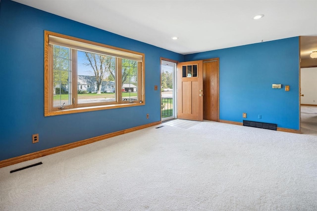 1820 Sampson St, Wisconsin Rapids, WI 54494 - carpeted empty room featuring baseboards and recessed lighting
