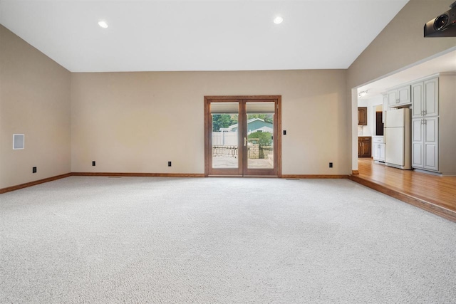 1820 Sampson St, Wisconsin Rapids, WI 54494 - spare room with light colored carpet, baseboards, recessed lighting, and vaulted ceiling