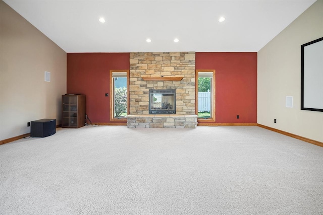 1820 Sampson St, Wisconsin Rapids, WI 54494 - unfurnished living room with an accent wall, baseboards, carpet flooring, and recessed lighting