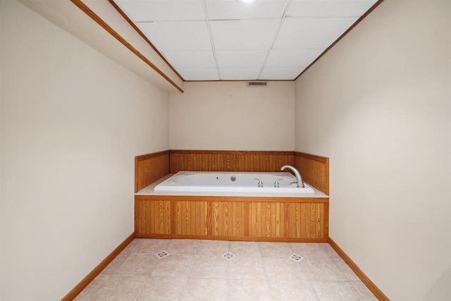 1820 Sampson St, Wisconsin Rapids, WI 54494 - bathroom with a bath, a paneled ceiling, tile patterned flooring, and baseboards