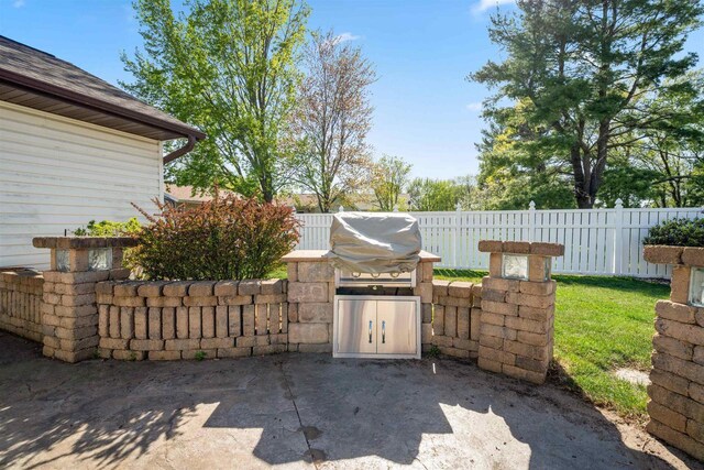 1820 Sampson St, Wisconsin Rapids, WI 54494 - view of patio / terrace featuring fence and a grill