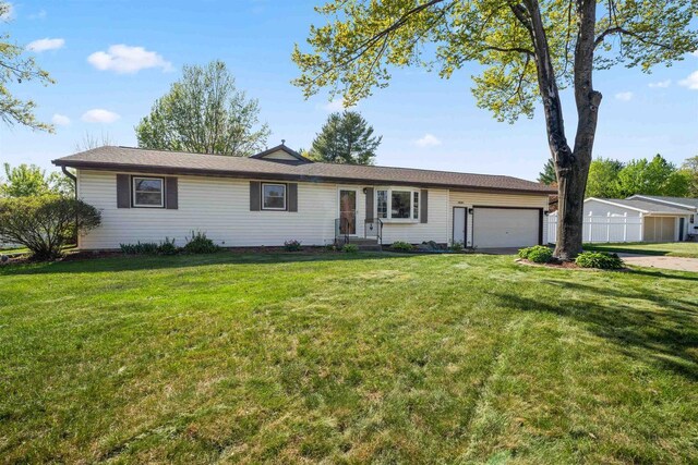 1820 Sampson St, Wisconsin Rapids, WI 54494 - ranch-style home featuring an attached garage and driveway