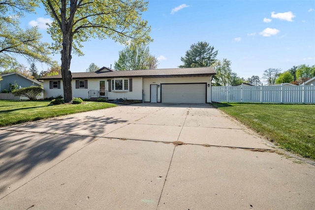 1820 Sampson St, Wisconsin Rapids, WI 54494 - ranch-style home with an attached garage and concrete driveway