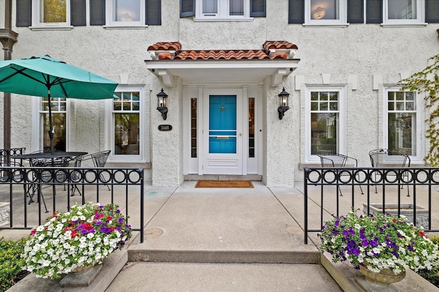 3468 N Summit Ave, Milwaukee, WI 53211 - entrance to property with stucco siding and a tile roof