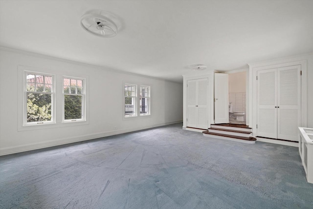 3468 N Summit Ave, Milwaukee, WI 53211 - unfurnished bedroom with carpet flooring, baseboards, and crown molding