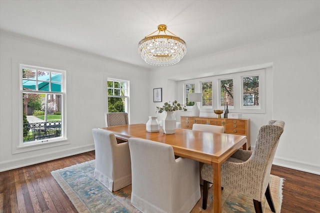 3468 N Summit Ave, Milwaukee, WI 53211 - dining area featuring ornamental molding, a chandelier, wood finished floors, and baseboards