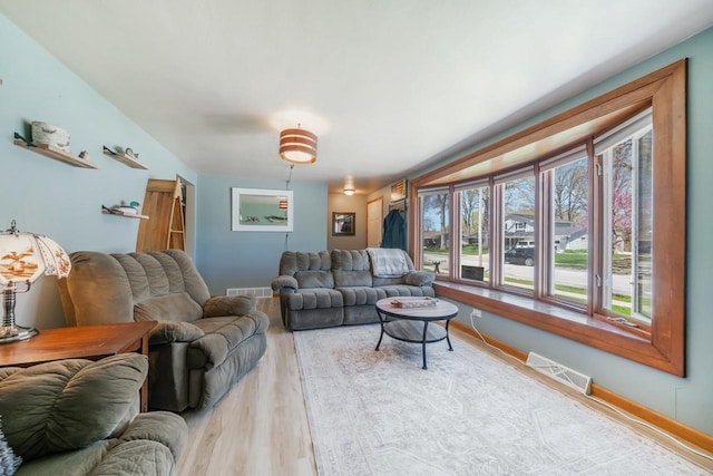 1083 Kenwood St, Green Bay, WI 54304 - living room featuring light wood finished floors