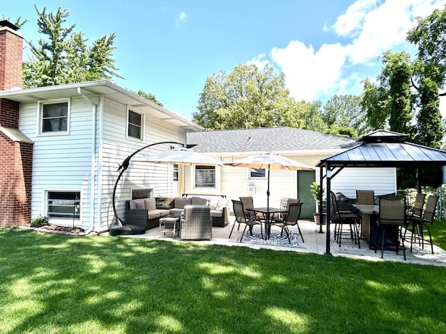 1083 Kenwood St, Green Bay, WI 54304 - rear view of property with a yard, a patio area, outdoor lounge area, and a gazebo
