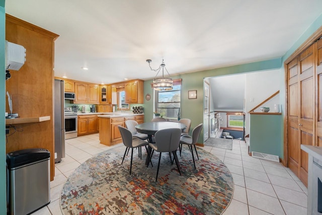 1083 Kenwood St, Green Bay, WI 54304 - dining room with light tile patterned floors and recessed lighting