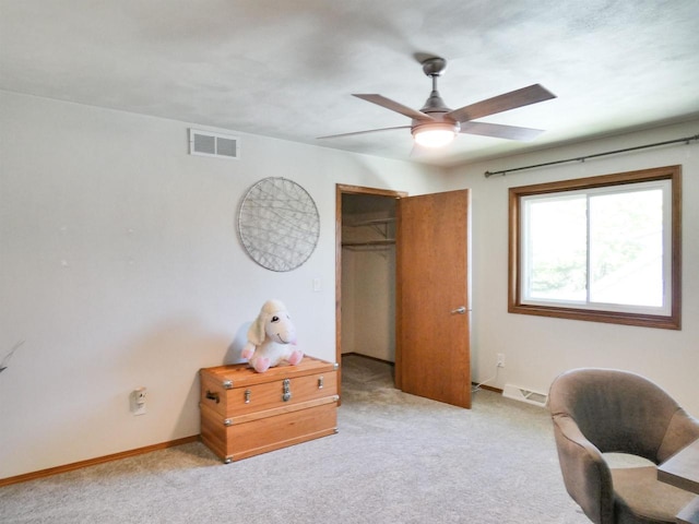 613 S Railroad St, Kimberly, WI 54136 - sitting room with ceiling fan, light carpet, and baseboards