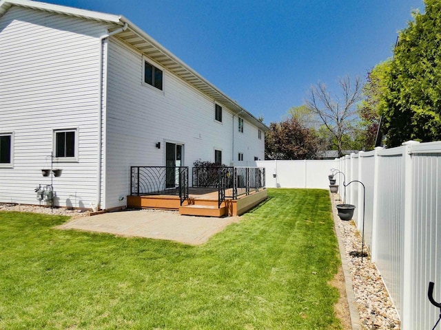 613 S Railroad St, Kimberly, WI 54136 - rear view of property with a wooden deck and a patio area